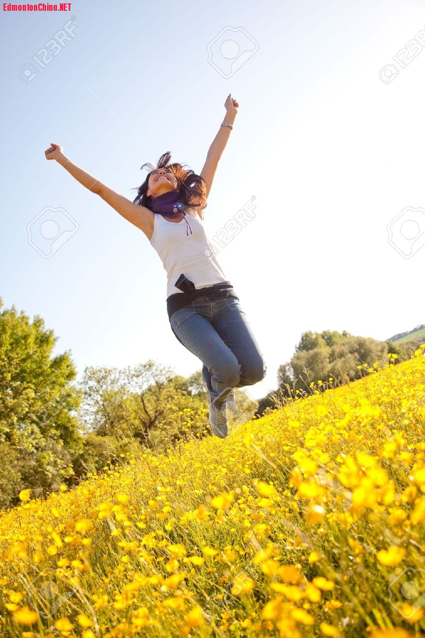 5322328-cheerful-woman-jumping-full-of-joy-Stock-Photo.jpg